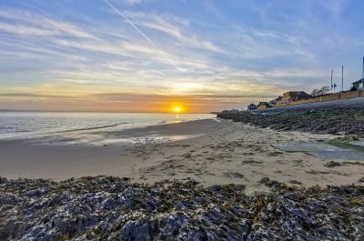 Sonnenuntergang im Watt vor dem Südstrand / Fliegerdeich.